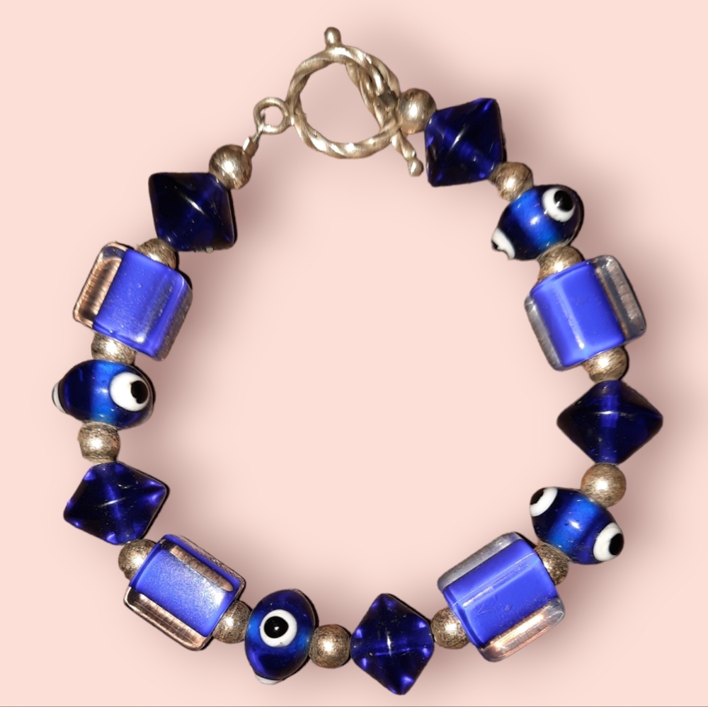 Sterling plated evil eye glass beaded bracelet with toggle clasp